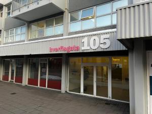 a store front of a building with the number at Baldursbrá Apartment Hverfisgata in Reykjavík