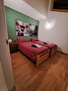 Postel nebo postele na pokoji v ubytování Appartamento Al Borgo