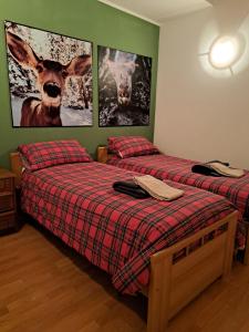 Postel nebo postele na pokoji v ubytování Appartamento Al Borgo