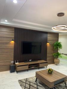 TV a/nebo společenská místnost v ubytování Integral Consults Apartment