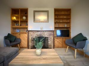 TV a/nebo společenská místnost v ubytování Cottage 427 - Clifden