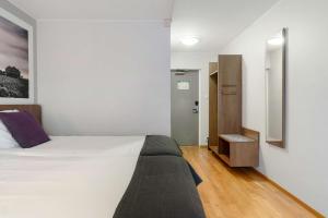 En eller flere senger på et rom på Best Western Karlshamn Spa & Relax