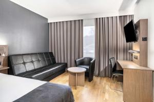 En TV eller et underholdningssystem på Best Western Karlshamn Spa & Relax