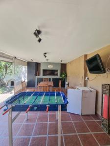 Instalaciones para jugar al tenis de mesa en Casa Ideal Para Familias En Córdoba Argentina o alrededores
