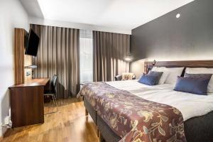 En eller flere senger på et rom på Best Western Karlshamn Spa & Relax