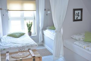 Letto o letti in una camera di Five Point Hostel & Apartments