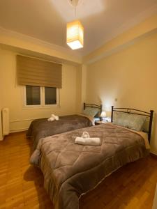Posteľ alebo postele v izbe v ubytovaní Elegant Apartment
