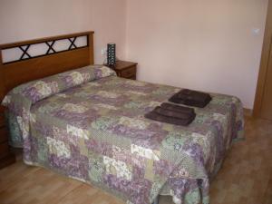 Postel nebo postele na pokoji v ubytování Hostal Abastos