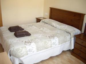 Postel nebo postele na pokoji v ubytování Hostal Abastos