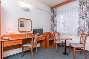 TV o dispositivi per l'intrattenimento presso Hotel Astra