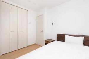 Ένα ή περισσότερα κρεβάτια σε δωμάτιο στο Kyoto Lanlan Villa +52 φωτογραφίες