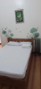 Łóżko lub łóżka w pokoju w obiekcie Villa Peralta Inn