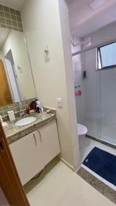 Koupelna v ubytování Apartamento altíssimo padrão - Piscina com vista