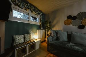 A seating area at Le Petit Jardin #2