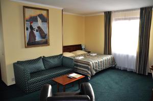 Postel nebo postele na pokoji v ubytování Hotel Terasa + 37 fotografií