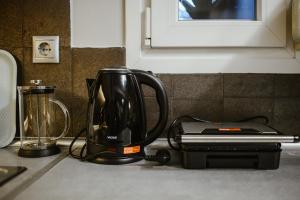 Coffee and tea making facilities at Le Petit Jardin #2