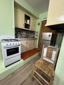 Kuchyň nebo kuchyňský kout v ubytování Homely Environment Studio Apt