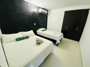 Letto o letti in una camera di Apartamentos Sweet Island