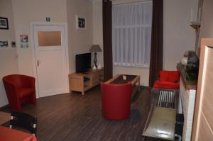 TV a/nebo společenská místnost v ubytování Apartment Sariks Place