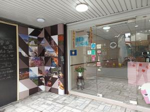 a store front of a store with a window at 博愛泊旅讀心境 in Hualien City