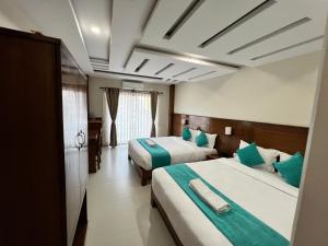 Ένα ή περισσότερα κρεβάτια σε δωμάτιο στο Hotel Triple Hill +82 φωτογραφίες