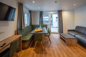 A seating area at Luxapart Haus 2