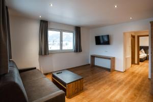 A television and/or entertainment centre at Luxapart Haus 2