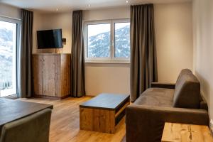 A television and/or entertainment centre at Luxapart Haus 2
