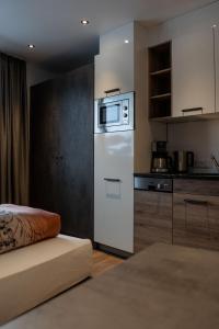 A kitchen or kitchenette at Luxapart Haus 2