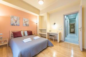 Ένα ή περισσότερα κρεβάτια σε δωμάτιο στο Rest Sleep Repeat by museum-2