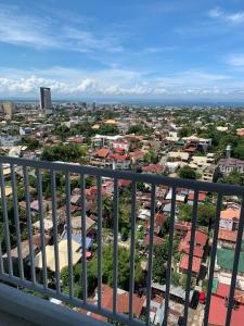 a view of a city from a balcony at YokosoCEBU & Private Parking in Cebu City