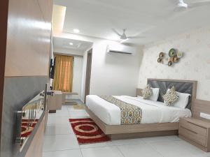 Posteľ alebo postele v izbe v ubytovaní Hotel Lotus