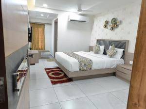 Posteľ alebo postele v izbe v ubytovaní Hotel Lotus