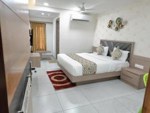 Posteľ alebo postele v izbe v ubytovaní Hotel Lotus