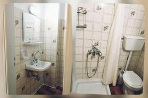 Koupelna v ubytování Hotel Faros