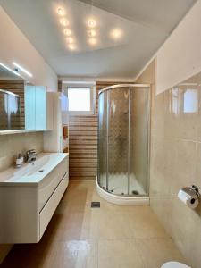 Kúpeľňa v ubytovaní Apartments Rino