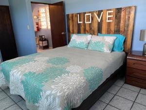 Voodi või voodid majutusasutuse Esperanza Inn Guesthouse toas