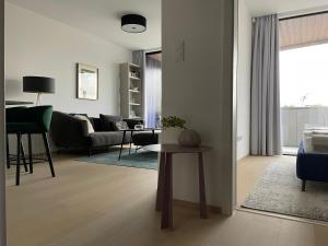 A seating area at Design Apartman - Free parking