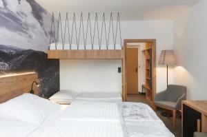 Posteľ alebo postele v izbe v ubytovaní Wellness Hotel Svornost