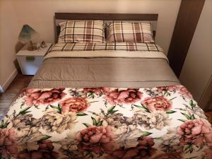 En eller flere senge i et værelse på Diva Apartment