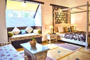 Paatlidun Safari Lodge, Jim Corbett客房内的一张或多张床位
