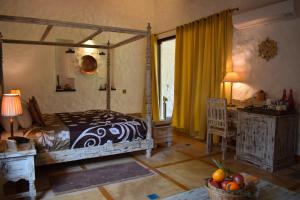 Paatlidun Safari Lodge, Jim Corbett客房内的一张或多张床位