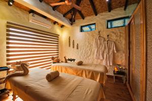Paatlidun Safari Lodge, Jim Corbett客房内的一张或多张床位