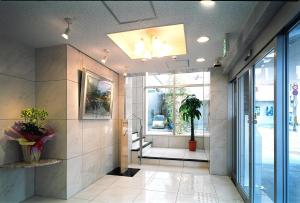 El vestíbulo o zona de recepción de Kochi Ryoma Hotel