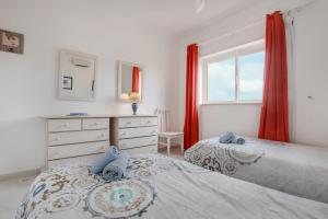 Ένα ή περισσότερα κρεβάτια σε δωμάτιο στο Ariana Apartment +14 φωτογραφίες
