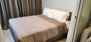מיטה או מיטות בחדר ב-Azure urban residences 1BR Unit fits max 3 persons