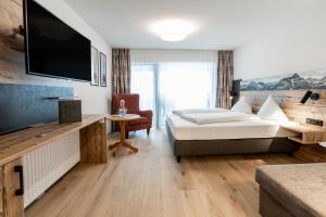 Rúm í herbergi á Hotel Alte Krone
