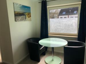 Area tempat duduk di M&M Hotel - Neu Wulmstorf