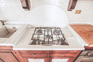 A kitchen or kitchenette at Casa Rosa di Luisa
