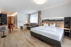 Rúm í herbergi á Hotel Alte Krone